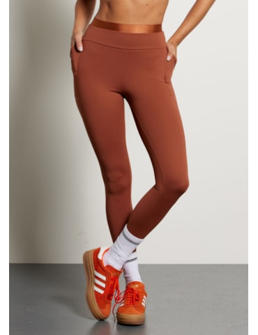 LEGGING COM BOLSO MOTION AR MARROM