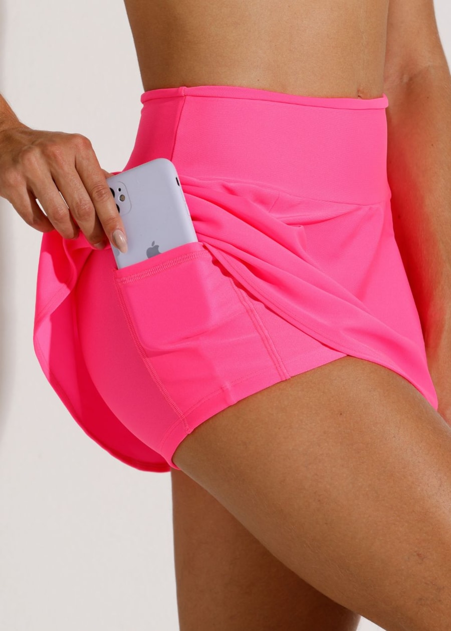 SAIA SHORT COM BOLSO FIT ROSA NEON