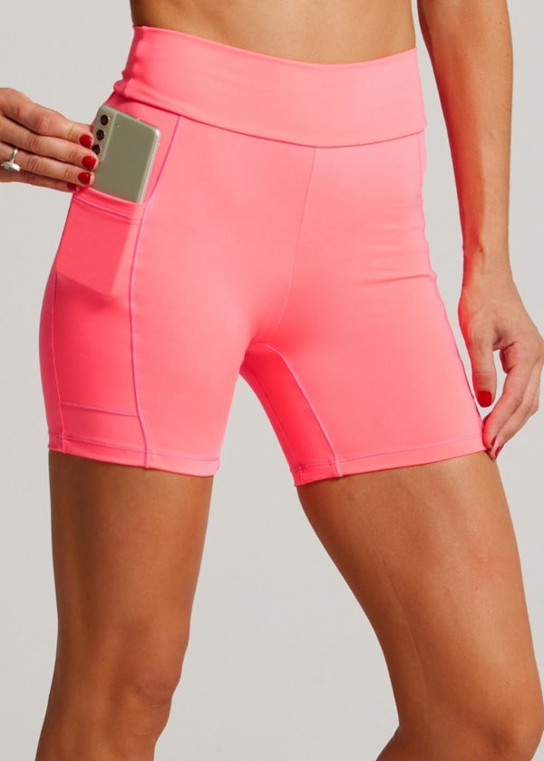 SHORT COM BOLSOS RUNNER ROSA NEON