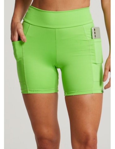 SHORT COM BOLSOS RUNNER VERDE NEON