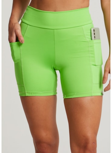 SHORT COM BOLSOS RUNNER VERDE NEON